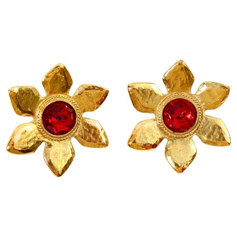 ysl stamped earrings red and gold swirl|ysl rhinestone earrings.